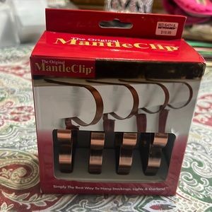 New in box Mantle clips
